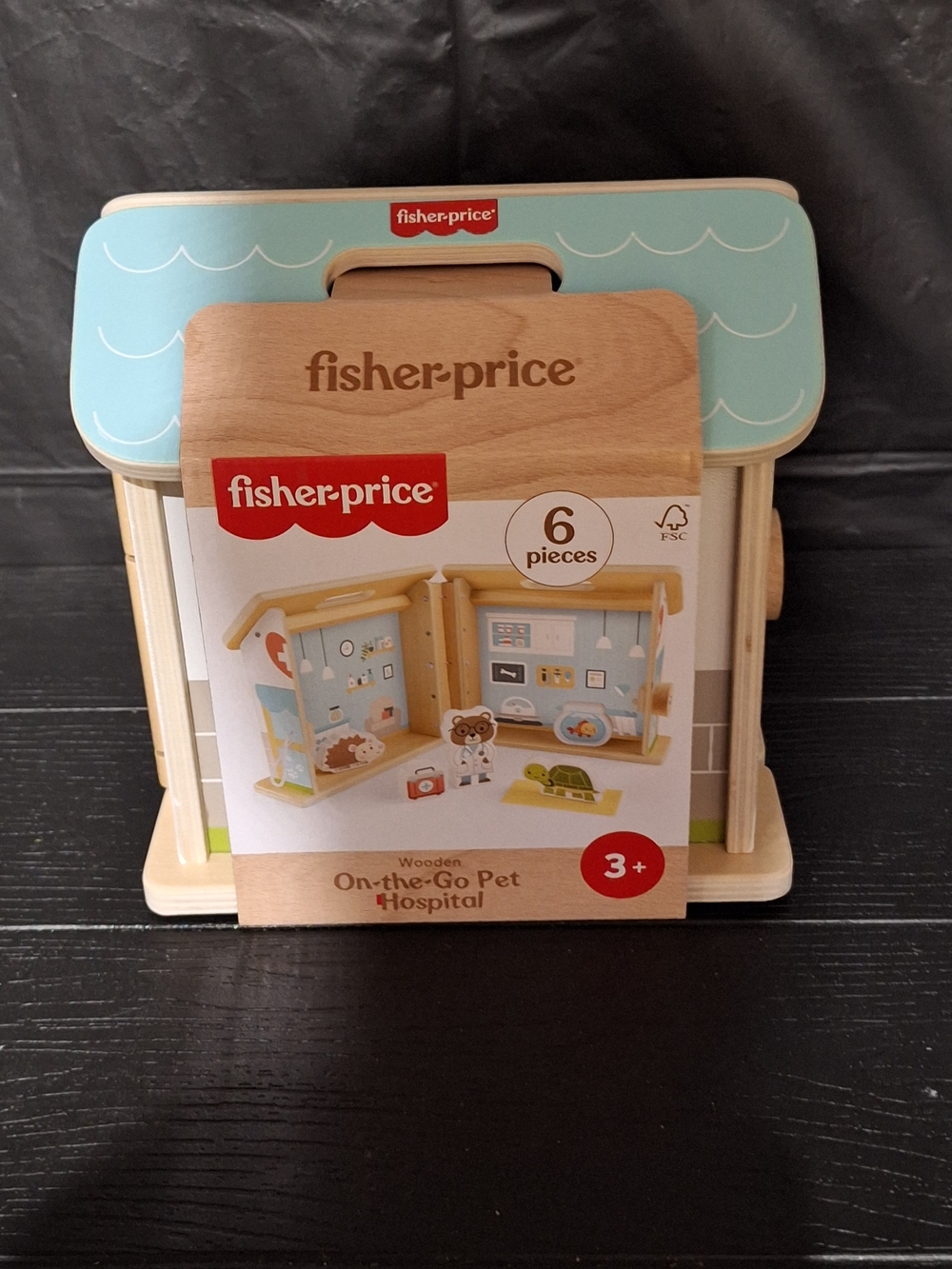 Fisher-Price Wooden Pet Hospital Playset in Light Blue and Natural Wood